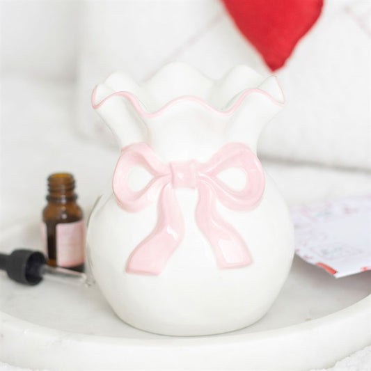 White and pink bow oil/wax burner